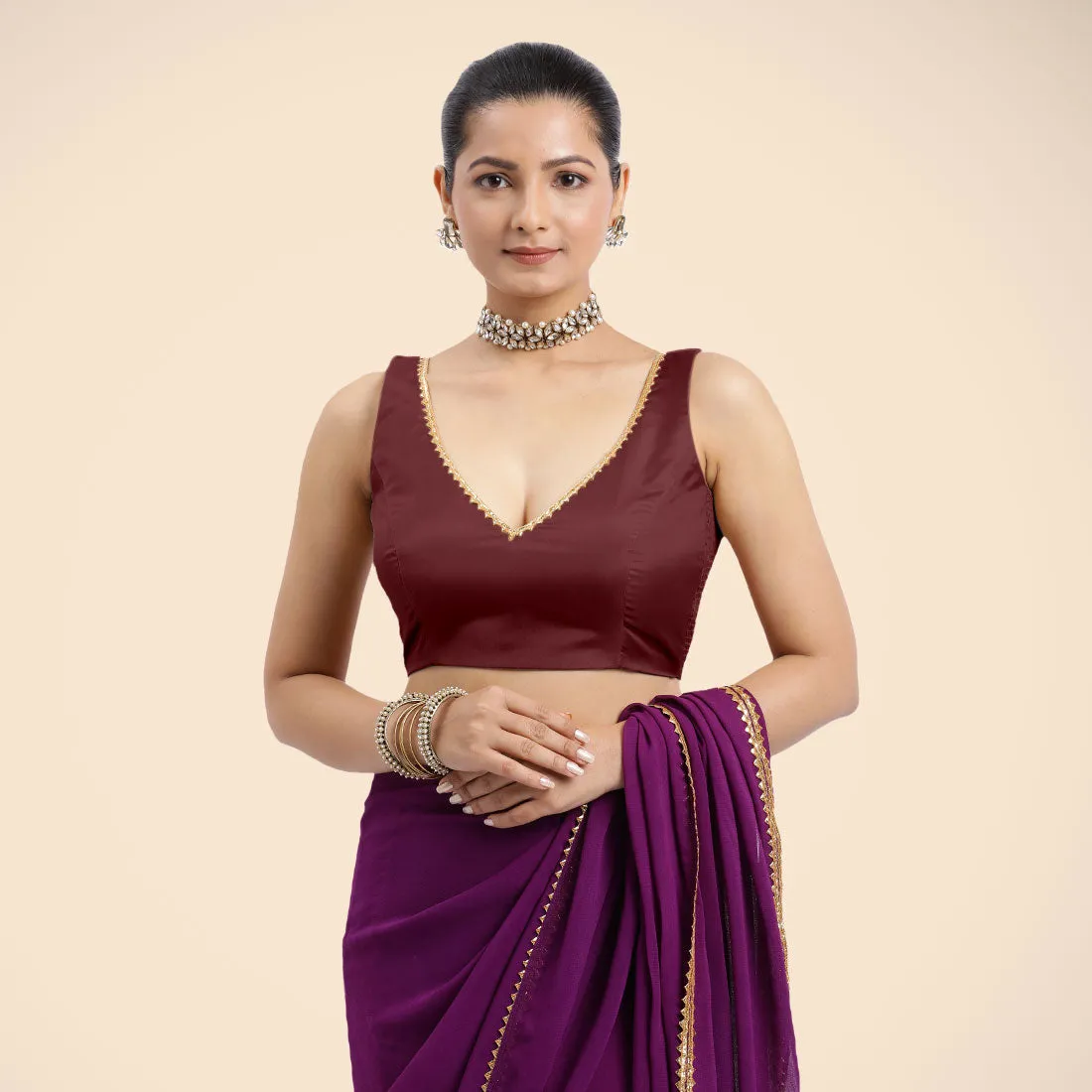 Raisa x Tyohaar | Burgundy Sleeveless FlexiFit™ Saree Blouse with V Neckline with Golden Gota Lace Embellishment and Back Cut-out with Tie-Up